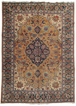 Mid century Tabriz rug featuring a navy central medallion with two teardrop medallions on a burnt orange field of crisp palmettes.  The ivory cornices and minor borders brighten the composition and highlight the shape of the field while the navy border both balance the medallion and frames the composition well. 