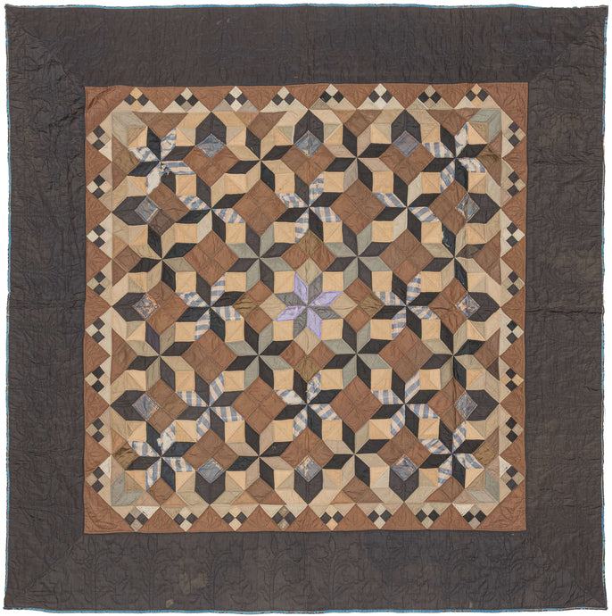 This exceptional quilt draws from the Mennonite tradition of bold geometric design. The classic LeMoyne Star, an eight-pointed star pattern introduced in America in the 19th century, is repeated and shaded to create a striking tumbling-block illusion across the entire field. The piecing demonstrates remarkable precision, with diamonds crisply aligned to build a rhythm of cubes and stars that shift depending on the viewer’s eye.