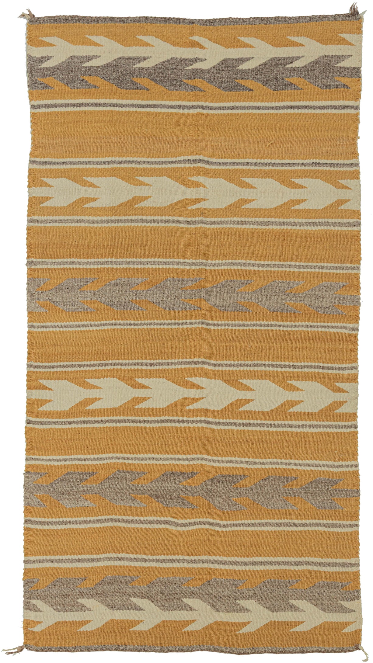 This Navajo rug was handwoven during the second quarter of the 20th century.

This Navajo rug features a warm golden fields framed by crisp stepped “arrow” or chevron bands in cream and a soft, muted purple. The alternating bands create a gentle, rhythmic movement across the textile. The palette is uncommon yet harmonious showcasing the beauty of handspun wool and classic Navajo design logic.
