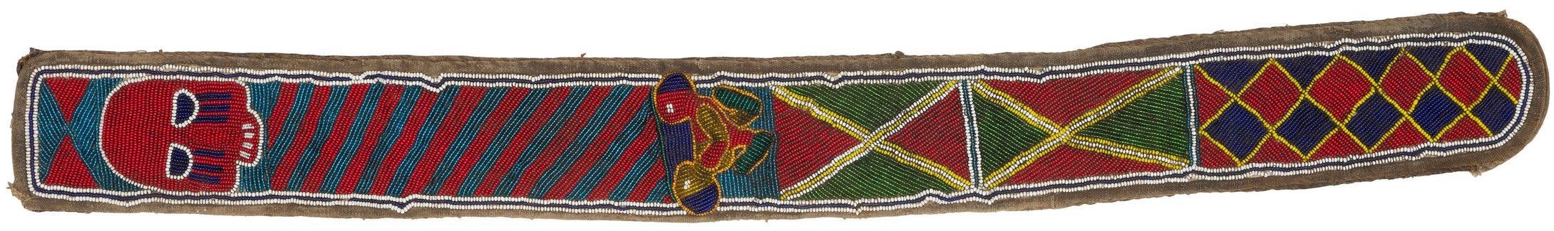 A striking Yoruba beaded sash from Nigeria, densely worked with glass beads in bold red, blue, green, yellow, white, and black. The long narrow form is divided into geometric panels with diagonal bands, diamond motifs, and a dramatic raised mask-like face at one end.