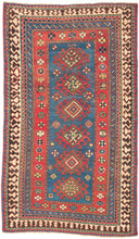 This Kazak was handwoven during the early 20th century in the southwest Caucasus.

A beautifully drawn Kazak featuring a chain of hooked diamond medallions on a vibrant sky-blue field. Each medallion is filled with either concentric diamonds or rubik's cube like grid in ivory, saffron, madder red, and deep indigo. Scattered rosettes and small geometric motifs animate the field, creating a lively rhythm. The border system is classic and powerful with an ivory “ram’s horn” outer border that encloses a richly 
