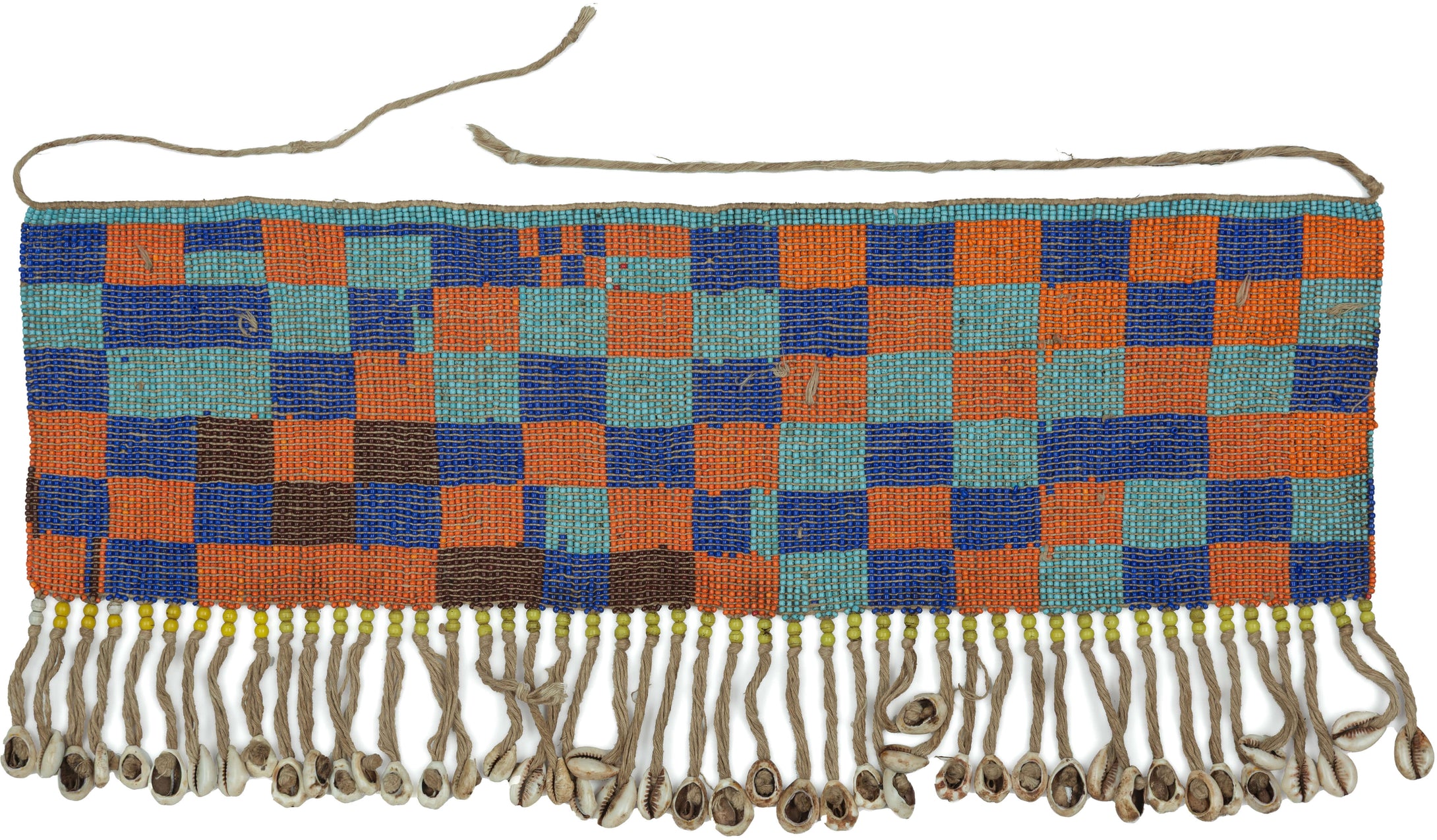 A vibrant beaded cache-sexe from Cameroon, composed of dense glass beadwork in bold blocks of orange, cobalt blue, turquoise, and brown. The lower edge is finished with&nbsp; cowrie shells.