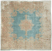 This Kerman rug handwoven during the second quarter of the 20th century.


It features a central medallion floating above an open turquoise ground and framed by a large and elegant border. The medallion and border are both composed of beautifully detailed floral sprays in pastel pinks, reds, seafoam green, copper, and gold and khaki.&nbsp;