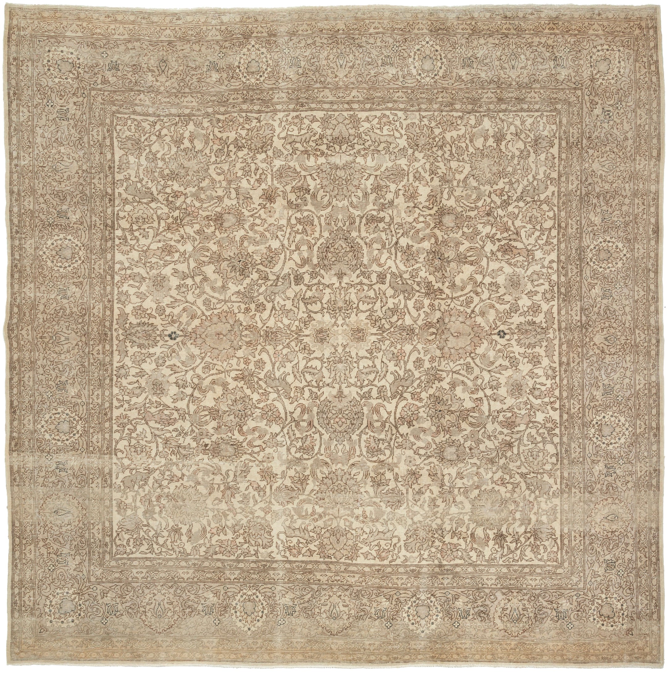A softly washed-out mid-century Sivas rug handwoven in central Anatolia, featuring an even, atmospheric palette and a finely detailed floral field. The original drawing remains legible yet subdued, creating a gentle, almost parchment-like surface where pattern and ground merge into a cohesive whole. Subtle animal figures are interwoven within the scrolling arabesques, revealing themselves gradually and rewarding closer looking.