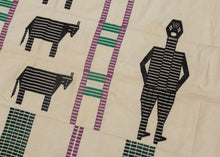 This blanket was likely woven in Nigeria during the middle of the 20th century.

It was woven in multiple stripes which have been attached horizontally. It features four human figures and six goats as well as various stripes in green, purple and black against an ivory ground. A wonderful and less common palette most often seen on Nigerian weavings. The figuresd and stripes have been completed using weft substition over the ivory strips.