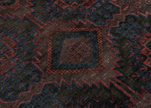  Timuri Baluch was handwoven during the second quarter of the 20th century in Western Afghanistan.

It features a lattice pattern of stepped diamonds and serrated polygons. With lush deep blue and red wool with a dark but lustrous complexion. The addition of a dark brown which has oxidized naturally sculpts the pattern and gives the shapes the feeling of floating in space. Bright speckles of white cotton have been woven around the main border adding a subtle touch of electricity. weft float