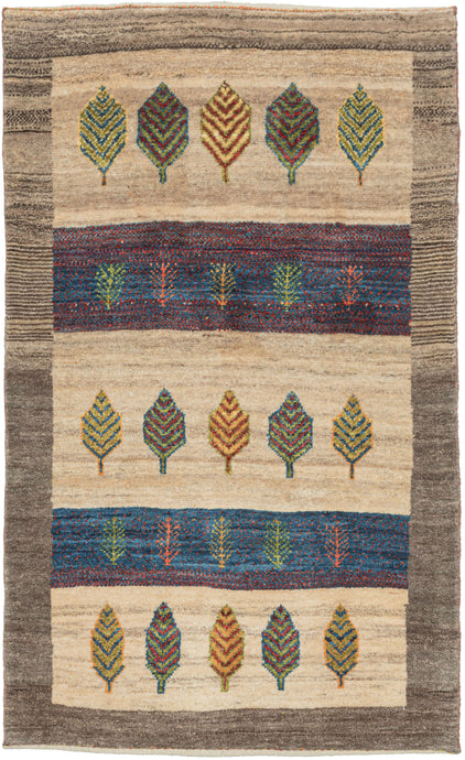 Contemporary It features alternating stripes of variegated undyed wool with stripes of red and blue. Each stripe contains simple representations of trees and vegatation in various colorful tones. Framed by a thick and wavy undyed wool border. The pile is densely woven, making this a plush rug.