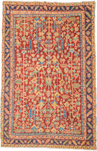 A joyful and highly decorative Heriz from the second quarter of the 20th century.

This piece is distinguished by its less common allover shrub and blossom field in lieu of the familiar central medallion. The shifting botanical forms, serrated leaves, and angular palmettes are rendered in a vivid yet harmonious palette with a brick red ground and accents of sky blue, soft yellow, celadon, apricot, and deep indigo accents. 