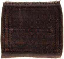 Afghan Baluch lattice design in blue, dusty pink and mauve pink. Plush silky wool with a very dark but lustrous complexion. Framed by an alternating "S" with contrasting sawtooth borders and finished with multiple bands of detailed weft float kilim. Originally intended to be used as a bag, remnants of the goat hair enclosures still survive. 