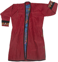 A hand sewn vintage silk chapan or overcoat from the&nbsp;Turkmen&nbsp;of Northern&nbsp;Afghanistan.&nbsp;

A chapan which means "sewn together" in Turkic&nbsp;is&nbsp;an overcoat that&nbsp;is adorned with&nbsp;detailed&nbsp;threading&nbsp;come in a variety of colors and patterns. It is traditionally worn&nbsp;throughout Central Asia.

This lovely chapan is crafted from crimson striped silk. It is embellished with fine black, white, and yellow embroidery around its perimeter and up the sides.