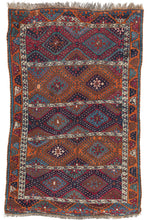 Antique Anatolian Kurdish Sarkisla rug featuring five alternating rows of hooked diamonds which are classic for this special type. Distinguished by both uncommon and unexpected palettes of purplish reds, burnt oranges, navy, cool white, and topaz blue. The end borders continue with half portion of the classic hooked diamonds where the side borders showcase a smaller scale more abstract version of the same form.