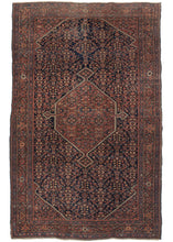 Antique Farahan Rug features a navy ground Herati design field with cornices and a central polygon medallion utilizing a red ground Herati pattern. A fun play of pattern and color that is finely woven and well-executed. The main border is a detailed scrolling palmette design with two minor borders of alternating rosettes.