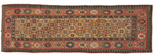 This Yellow Shirvan Runner features lattice-filled eight-pointed stars on a rare and desirable yellow ground. The stars are laid out in diagonal columns which are rendered in rich reds and blues and green jewel tones. It is framed by a main border of both small and large Talish rosettes on a salmon ground with an inner border of carnations and an outer laleh abbasi guard border in contrasting tones of turquoise and chocolate.