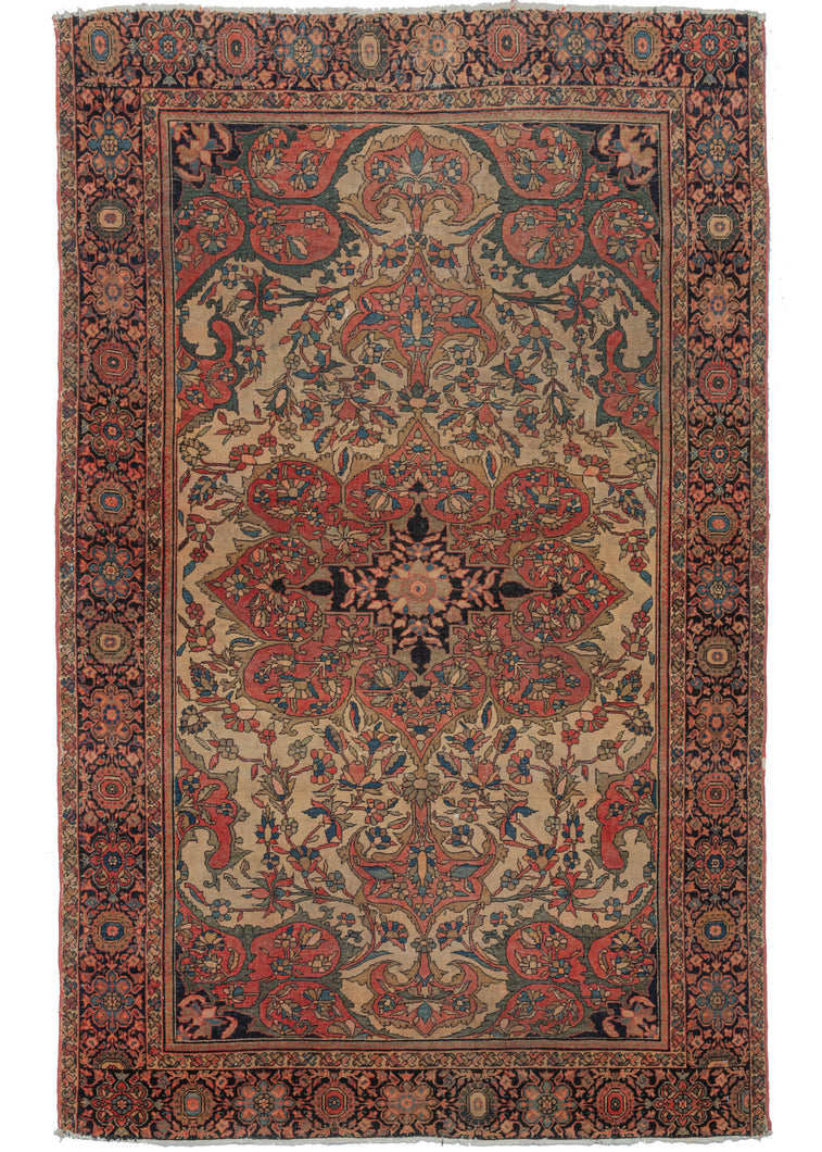 This 19th Century Antique Farahan Sarouk is composed of a brick central medallion with an inky black center flanked by double teardrop medallions on an ivory ground. Very dainty and fine curvilinear tendrils and floral vines make up the overall design, and the whole is framed by four scalloped cornices.