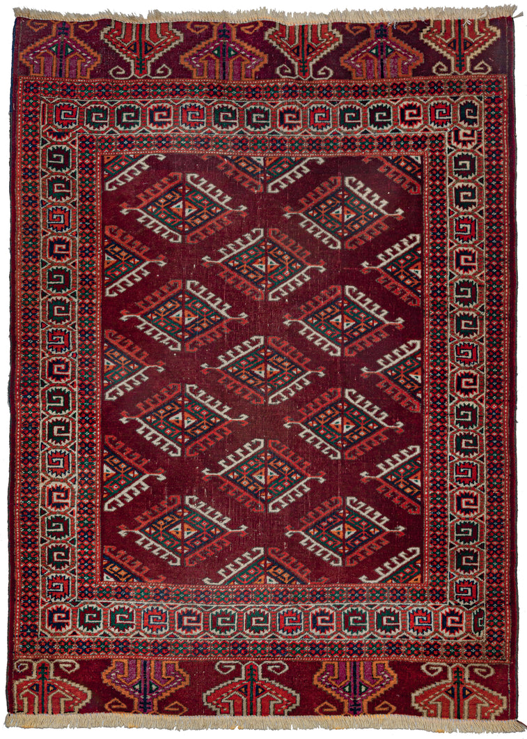 This Midcentury Yomud Turkmen Rug features an allover 