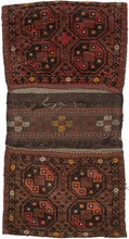 Turkmen double saddlebag or "Khorjin" handwoven in Central Asia during middle of 20th century. Rosette design in sumac between the bag faces. Four large guns in the center framed by a thin border. Reds, browns and yellows. 
