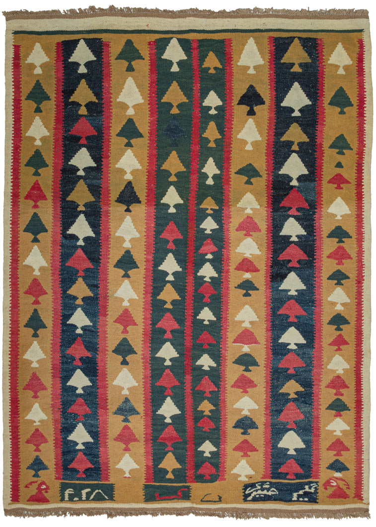 This Contemporary N Persian Kilim features columns of polychrome spade-like or vegetal forms on yellow and green ground tones delineated by thick red lines. The likely unintentional shift in scale adds visual interest and personality to the piece.