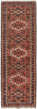 Vintage Nw Karaja small runner featuring a pattern of alternating geometric shapes and hooked lozenges on a soft red ground. Blues, green, purple, gold, pink, and ivory provide a well-balanced palette. In a rare narrow and short runner format.