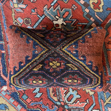 Pillow crafted from fragments of handwoven antique Kurdish rug from Northwest Iran.